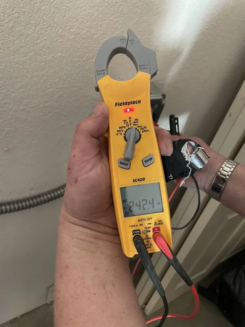 Voltage testing with clamp meter during Circuit Breaker Repair in Pigeon Forge